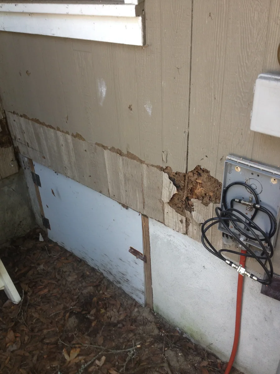 Exterior room wall with visible damage before rebuild work